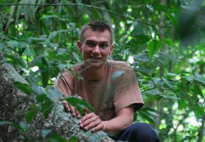 bryson sitting on tree